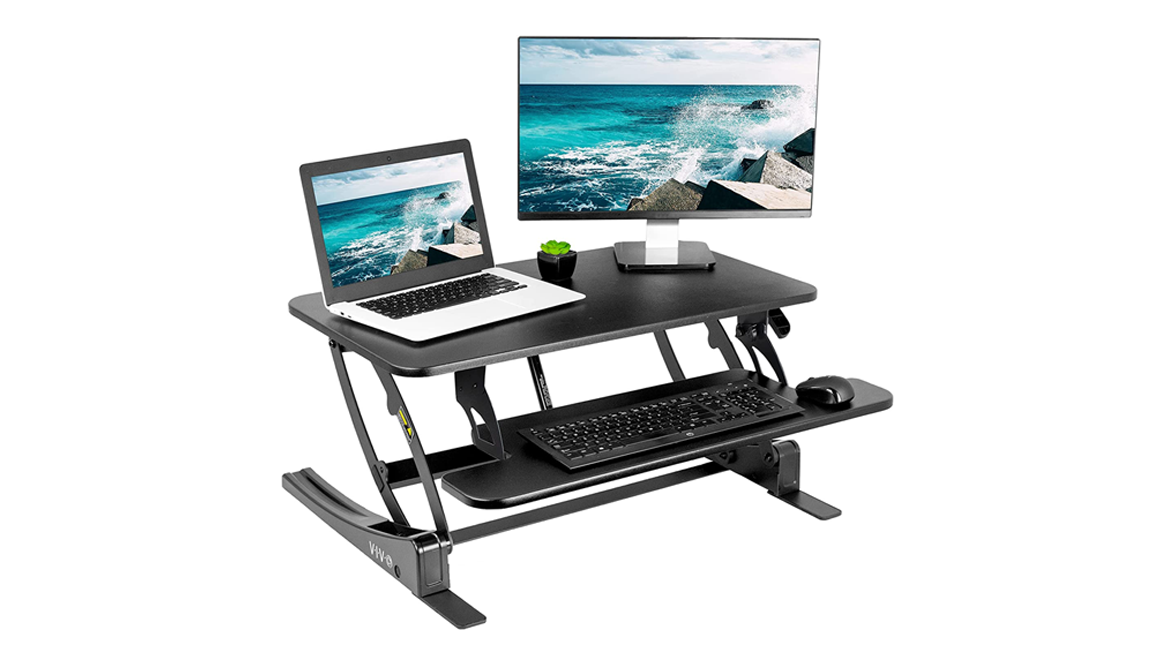 1. VIVO ADJUSTABLE 32-INCH DESK RISER